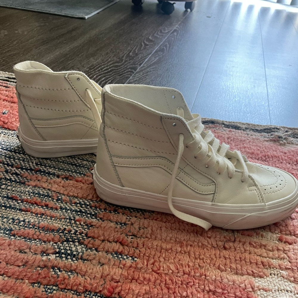 Vans leather high tops in cream